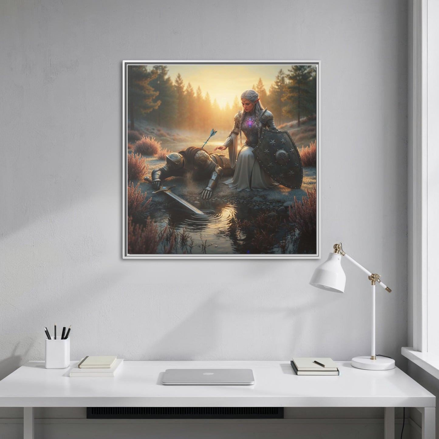 White framed Lumera and fallen Knight canvas from Chapter 1 hanging straight-on above a minimalist white desk in a bright workspace.
